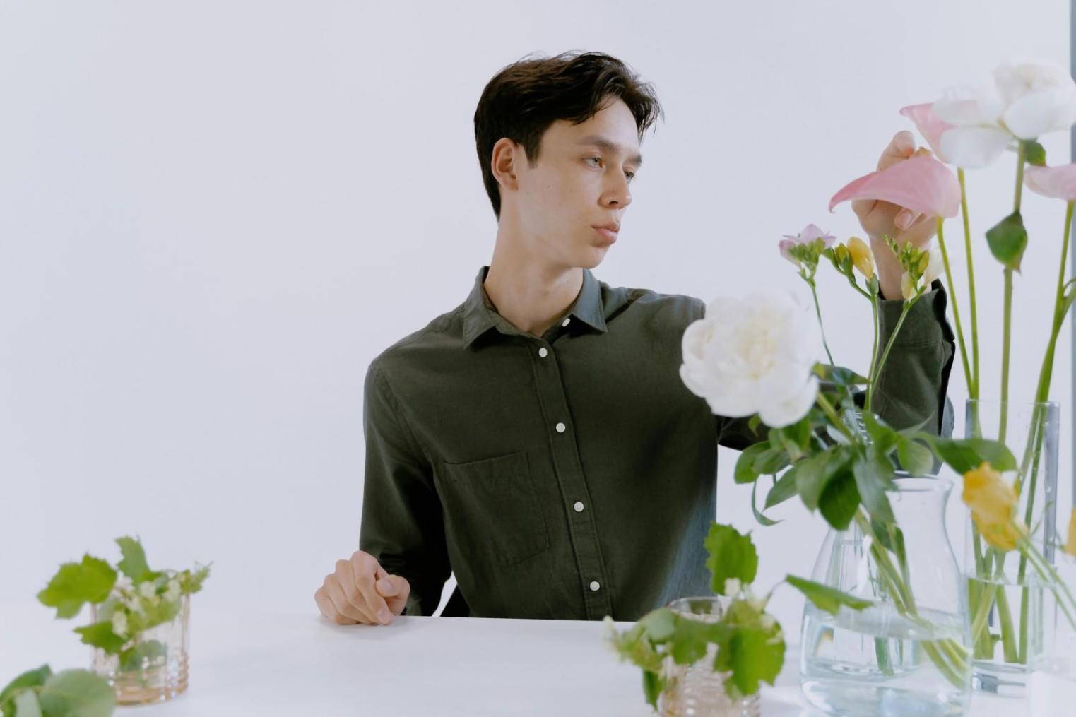 Close-up detail of innovative floral arrangement technique showing structural support